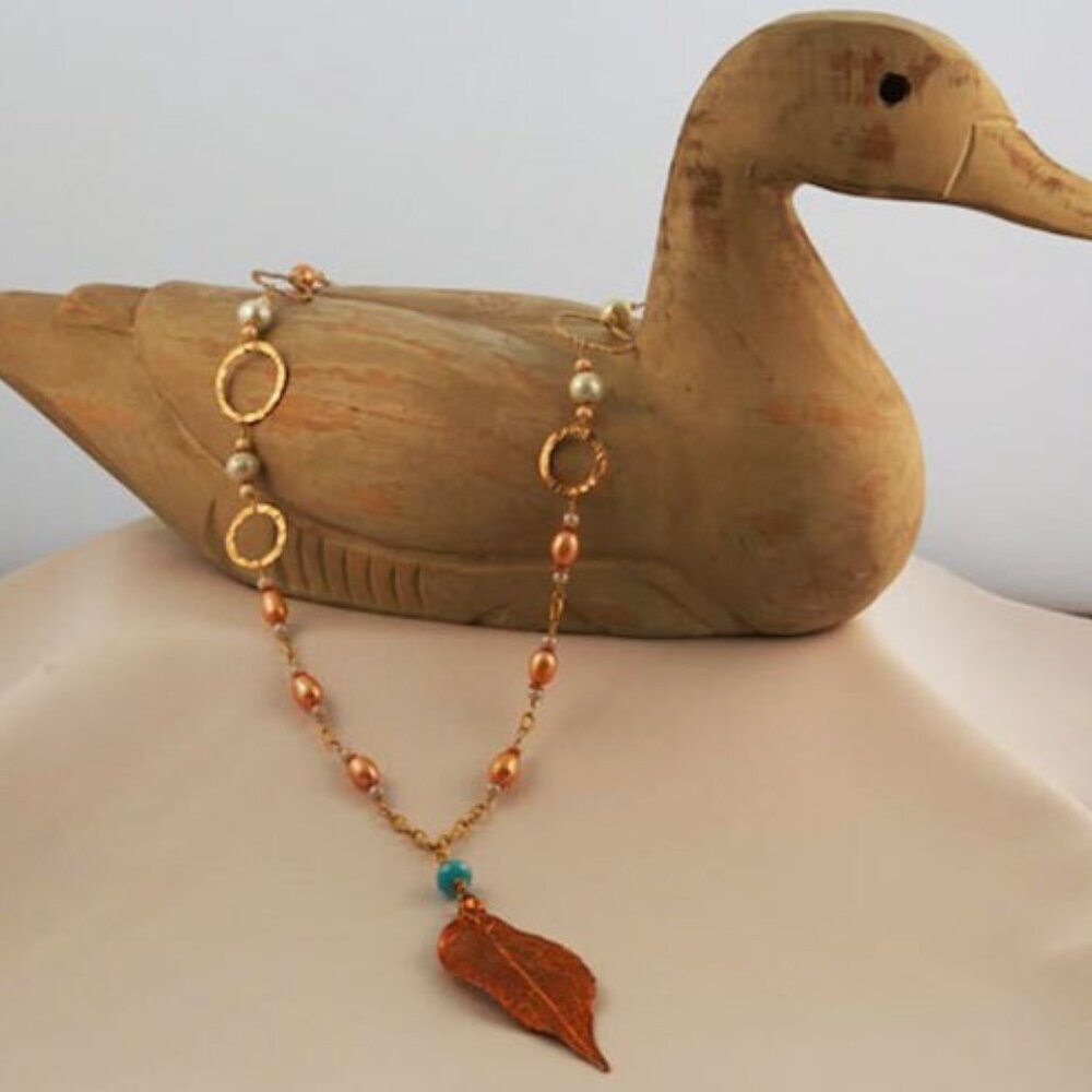 Hand made gold necklace with gold and blue fresh water pearls